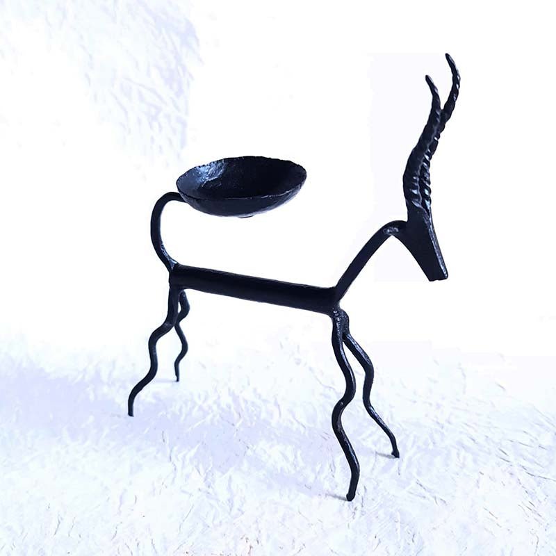 Pair of handmade wrought iron tealight holders adorned with deer motifs in the Bastar style
