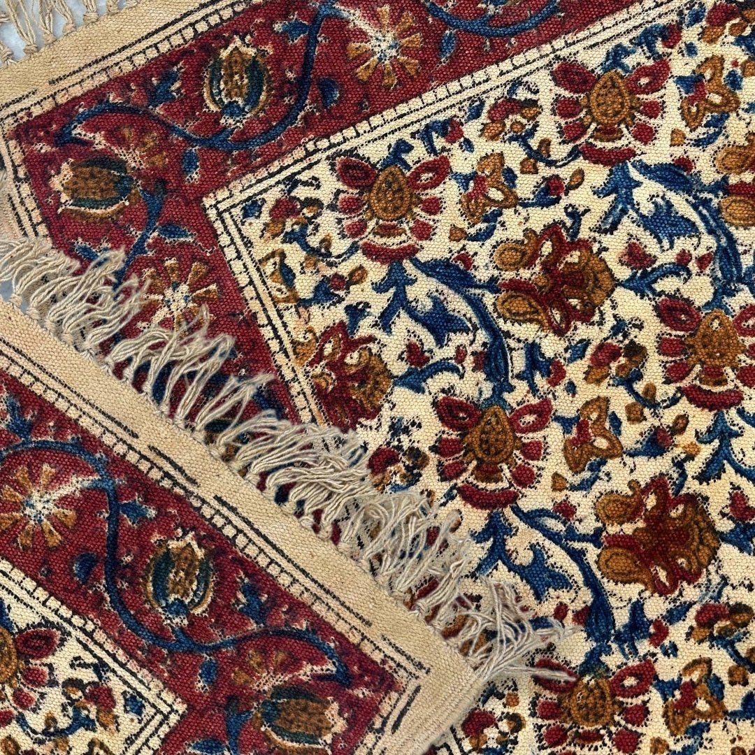 Handcrafted Kalamkari Print Cotton Rug with a Maroon, Beige, and Blue Floral Design