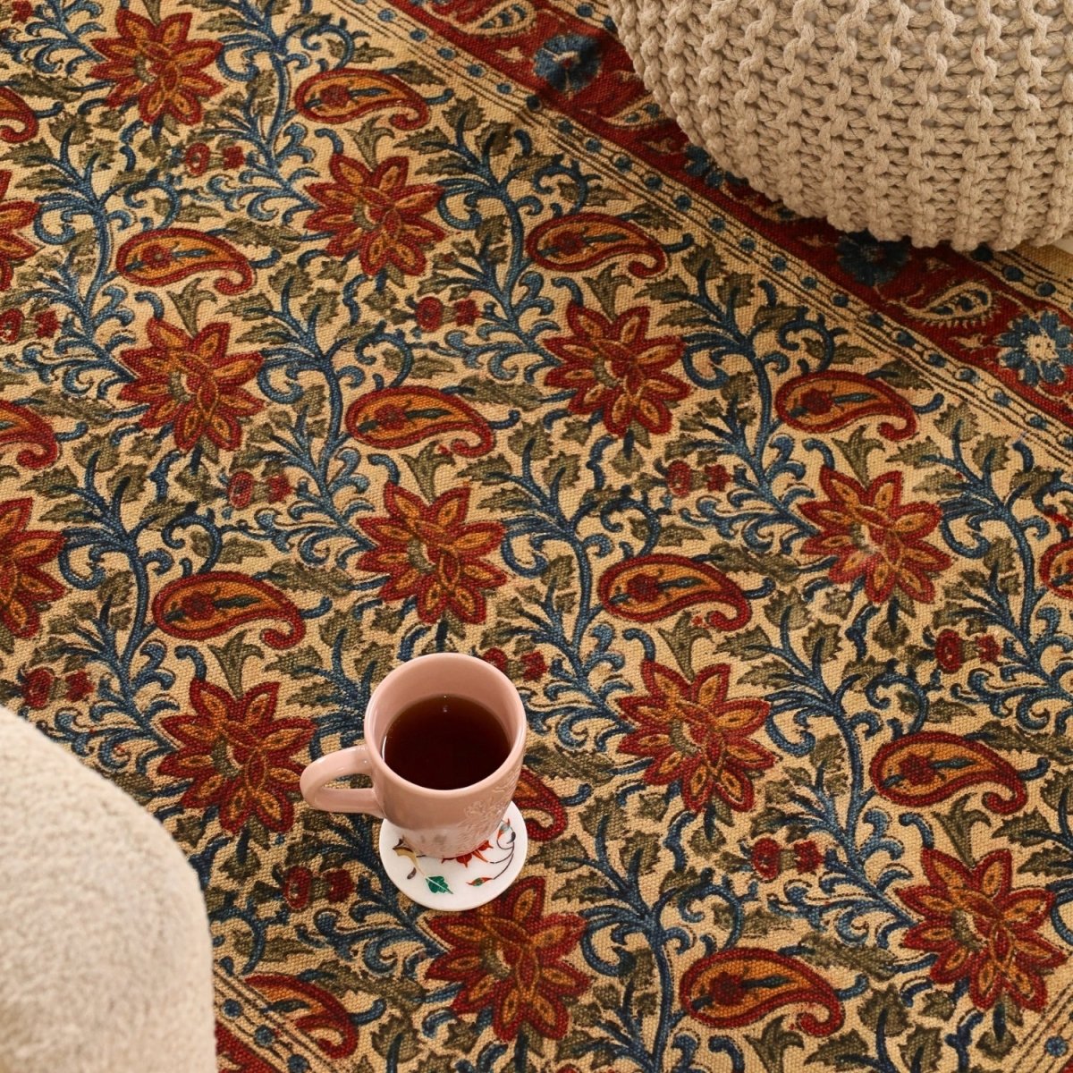 Handcrafted Kalamkari Print Cotton Rug with a Paisley Pattern in Red, Blue, and Beige