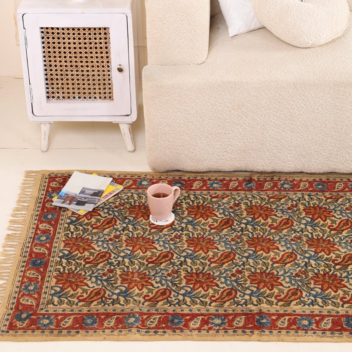Handcrafted Kalamkari Print Cotton Rug with a Paisley Pattern in Red, Blue, and Beige