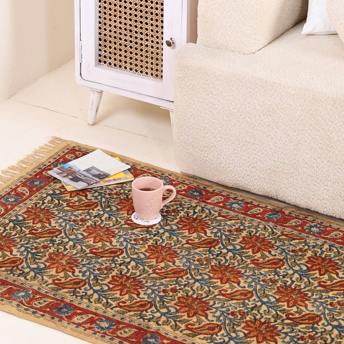 Handcrafted Kalamkari Print Cotton Rug with a Paisley Pattern in Red, Blue, and Beige