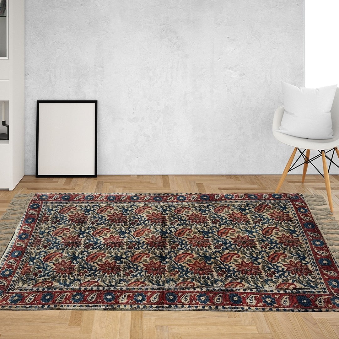 Handcrafted Kalamkari Print Cotton Rug with a Paisley Pattern in Red, Blue, and Beige