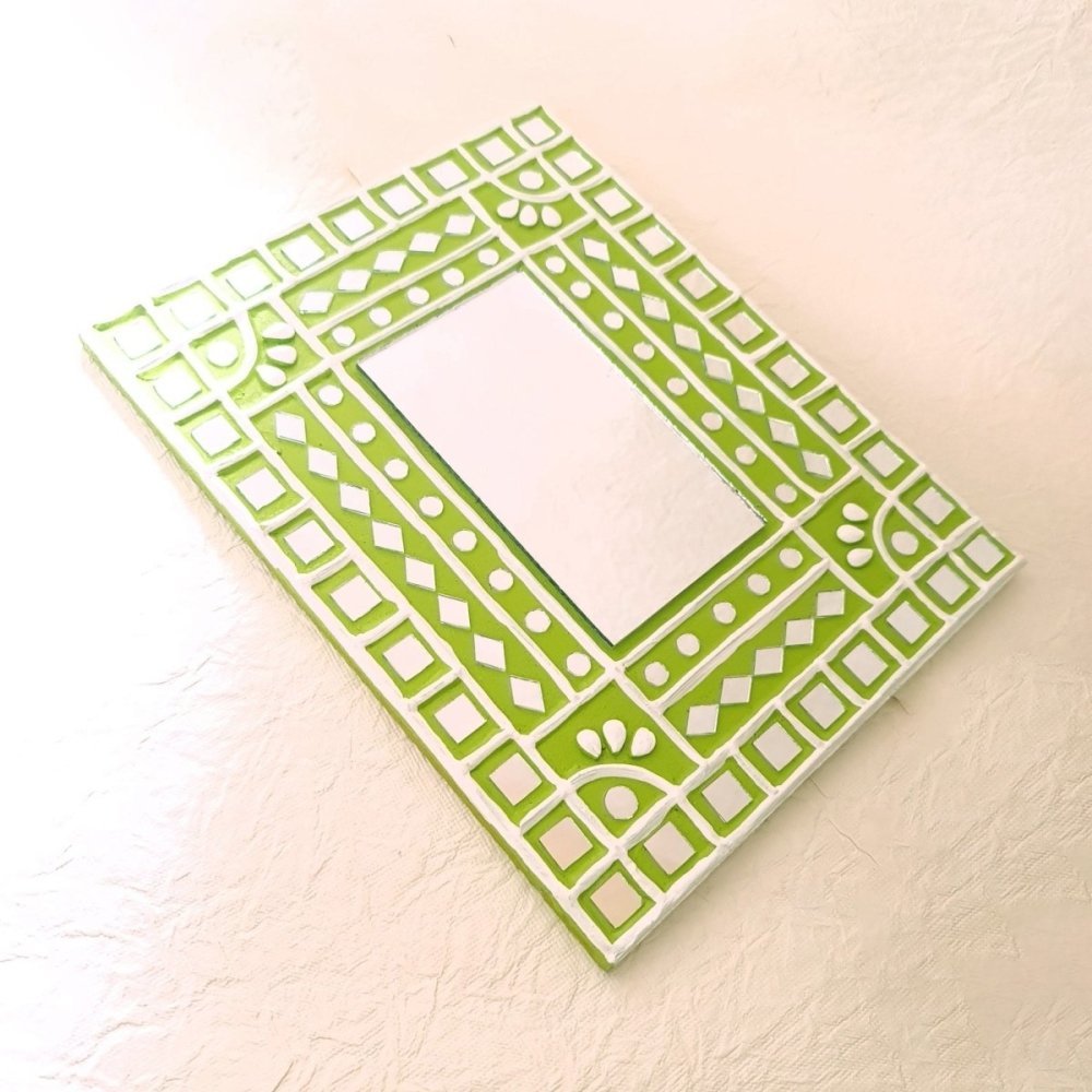 Decorative lime green handcrafted mirror work wall decor, perfect for adding a pop of color and style