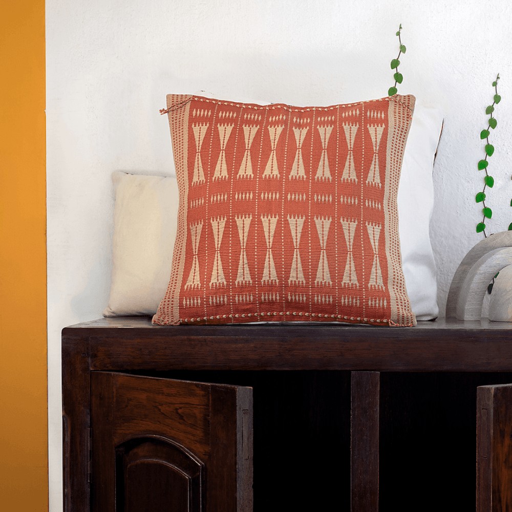 Subtle Contrast: Beige Cushion with Tangerine Accents