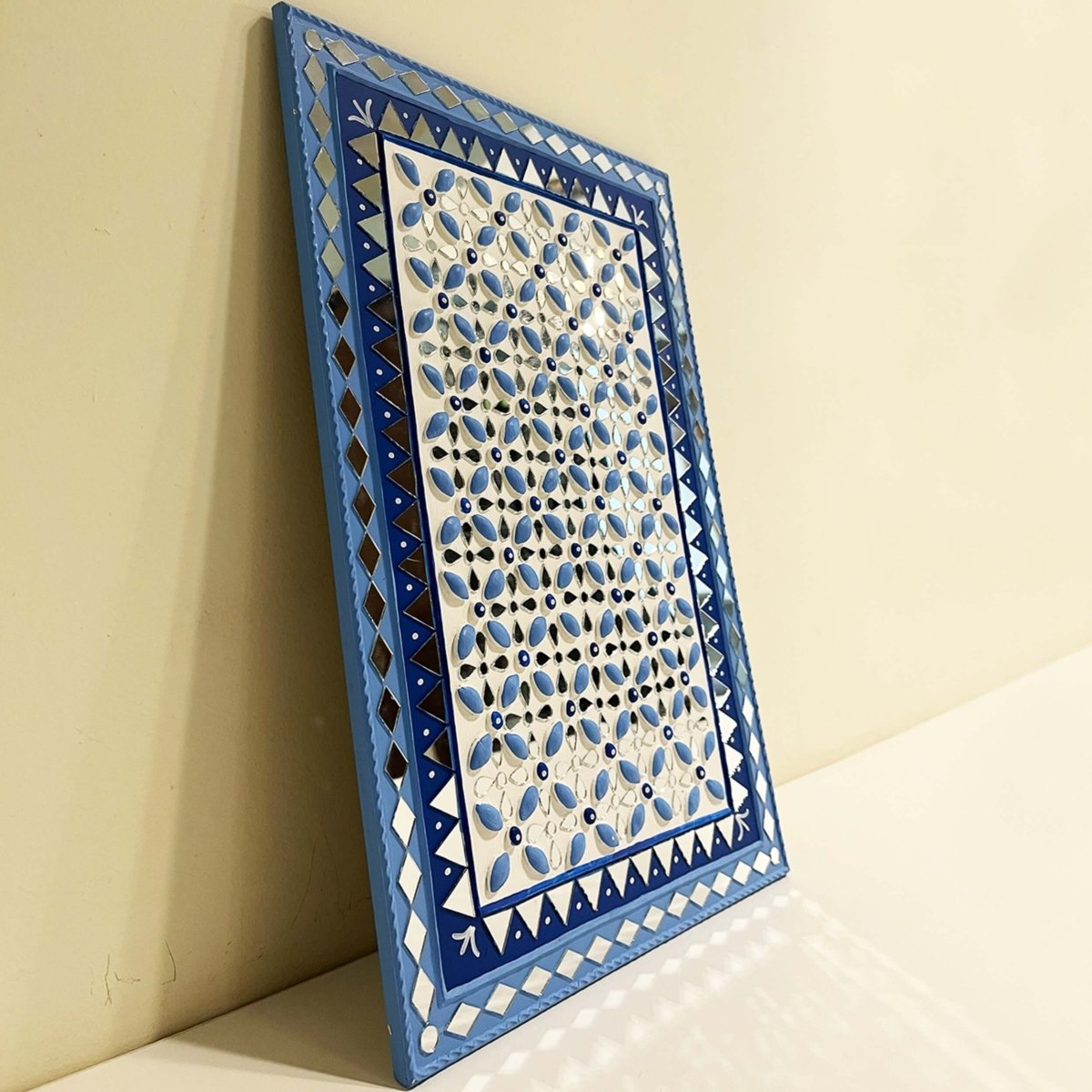 Palace blue handmade mud art wall hanging, featuring a rich color and intricate design