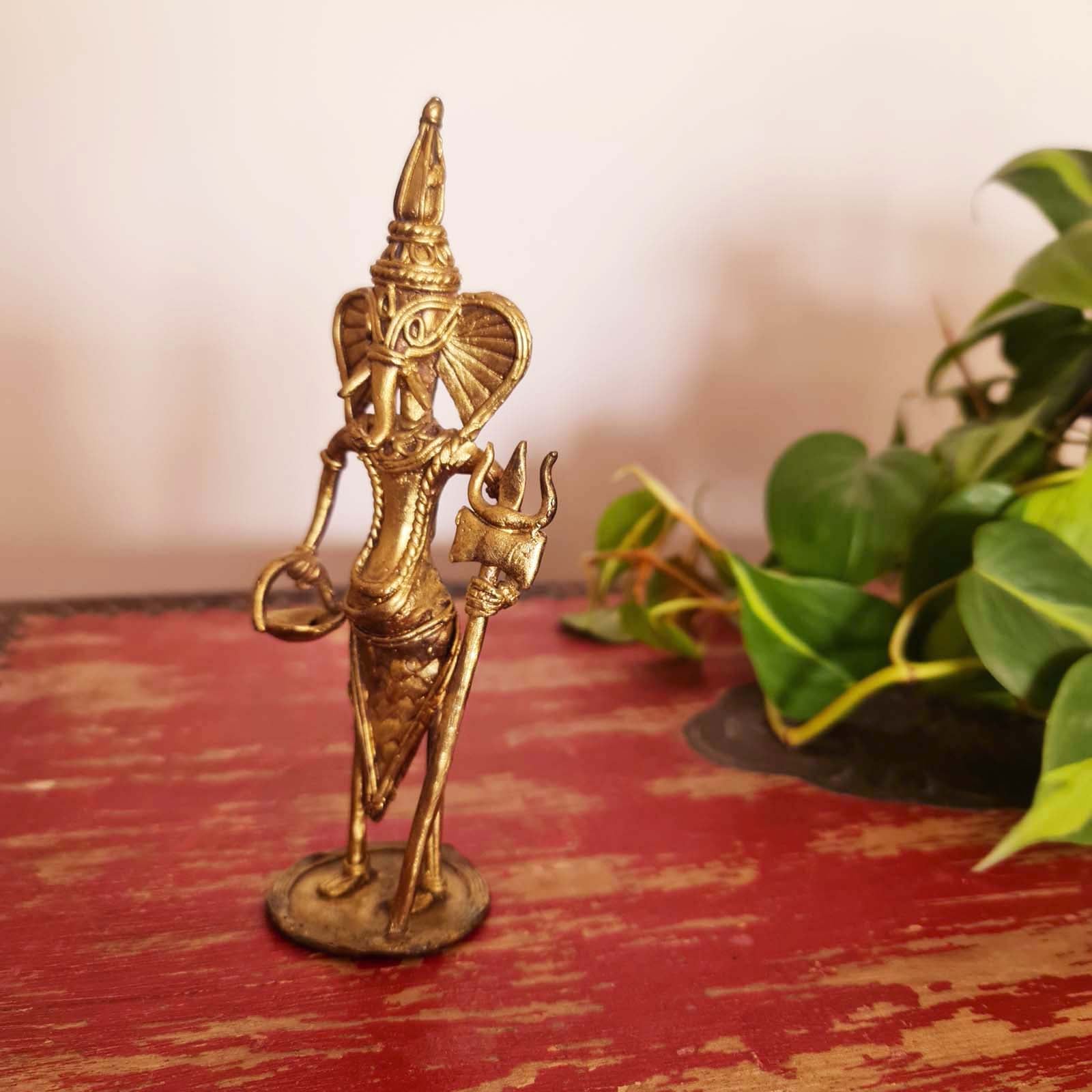 Dhokra metal sculpture of Lord Ganesha, crafted by hand with intricate details