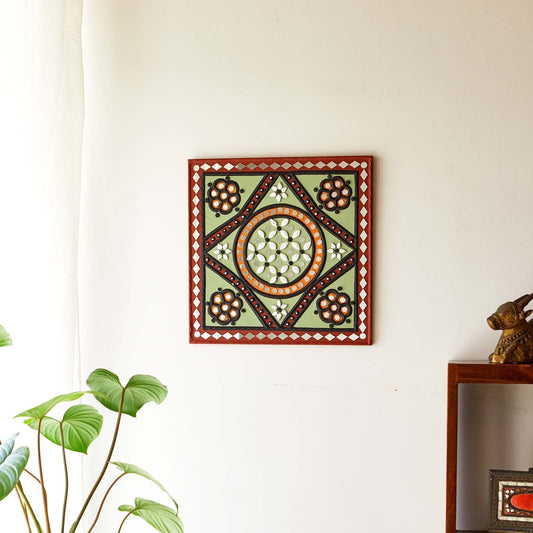 Green patterned handcrafted mud and mirror wall art, adding a rustic and artistic touch 