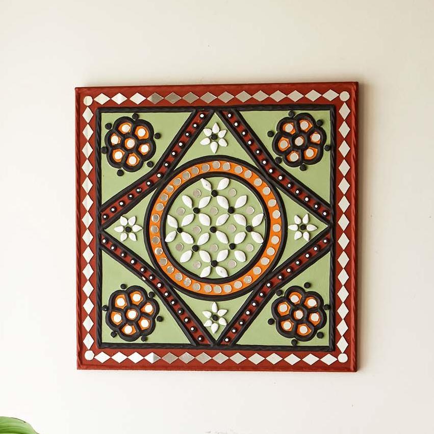 Artisanal green patterned handcrafted mud and mirror wall art, showcasing traditional craftsmanship 