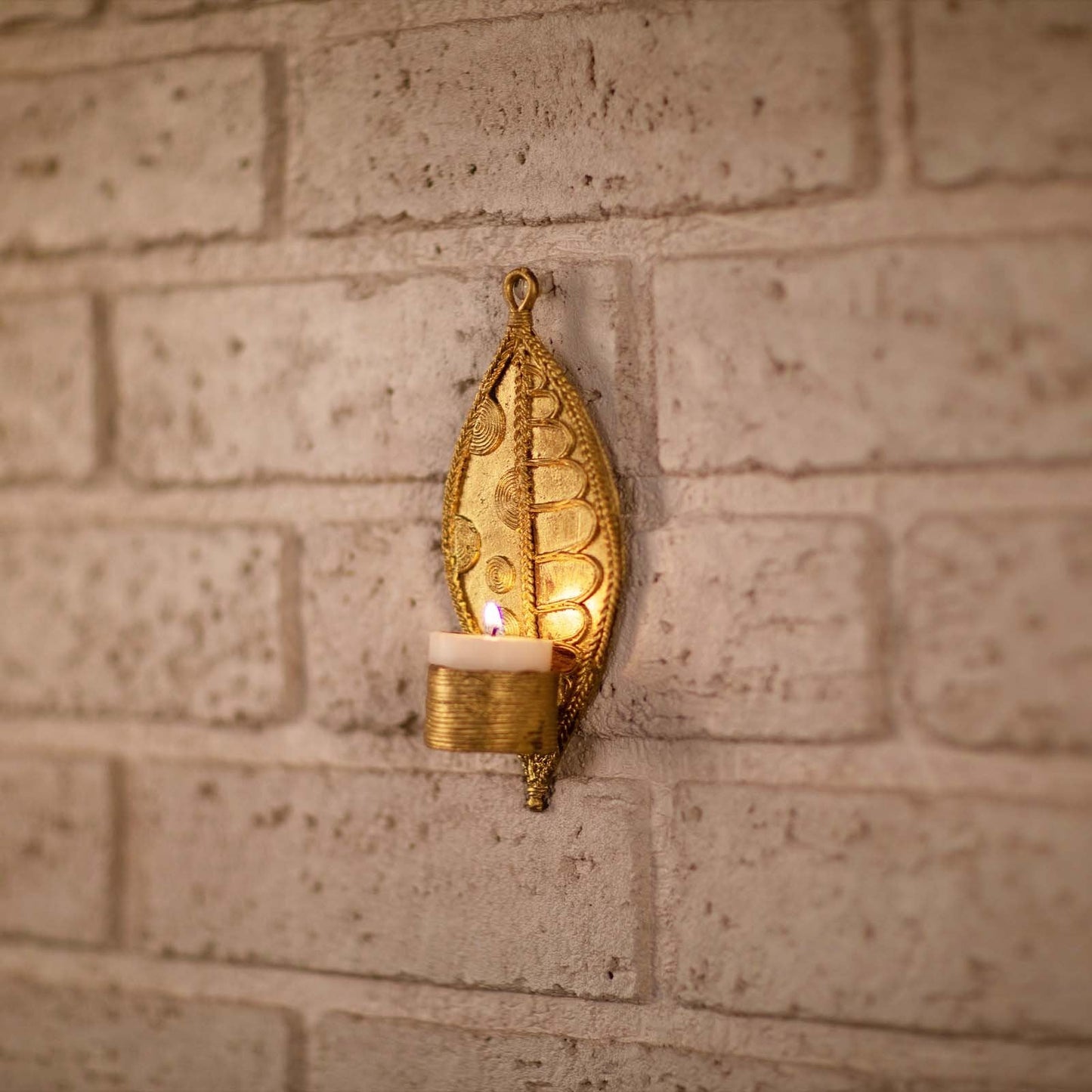 Pair of handmade Dhokra metal leaf-shaped tealight holders