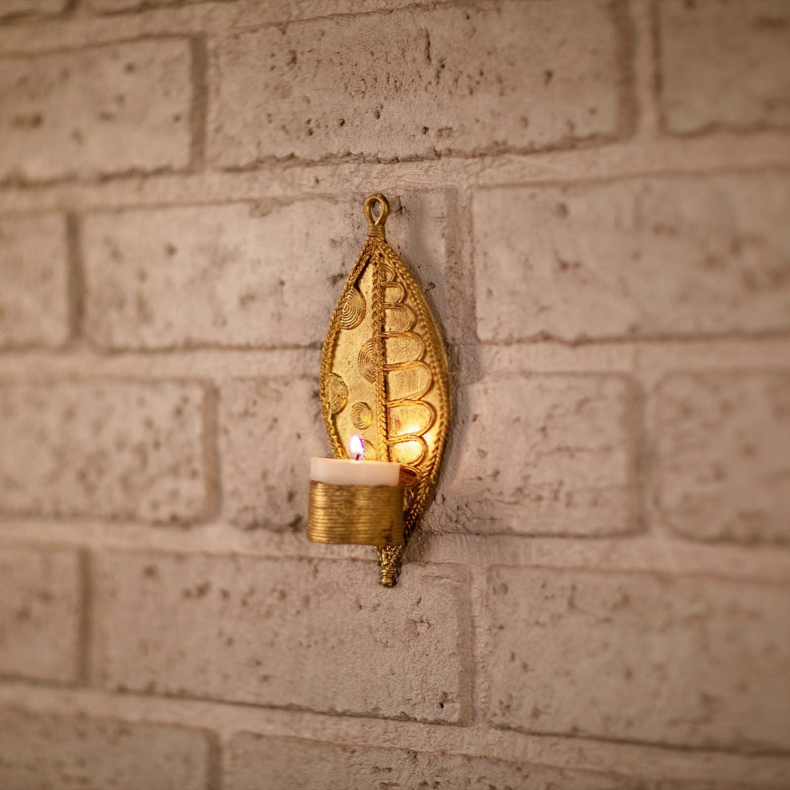 Pair of handmade Dhokra metal leaf-shaped tealight holders
