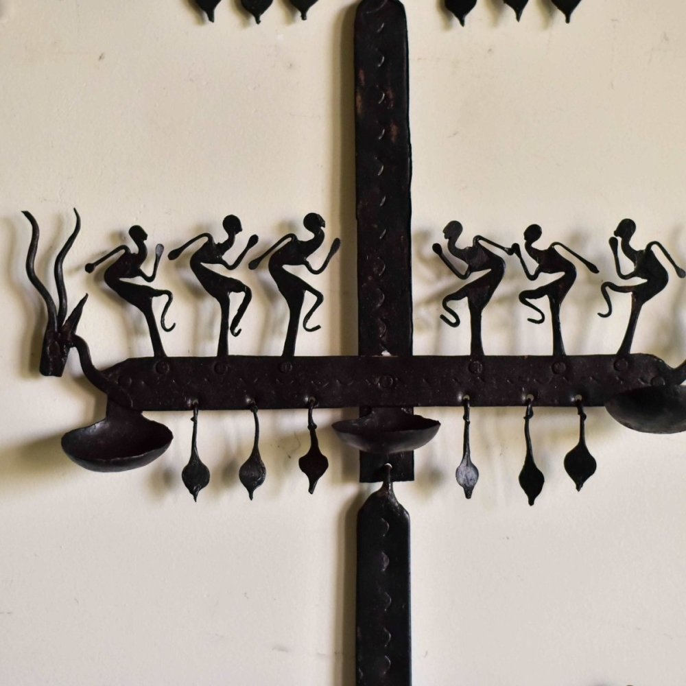 Ornate wrought iron stand influenced by Bastar tribal culture