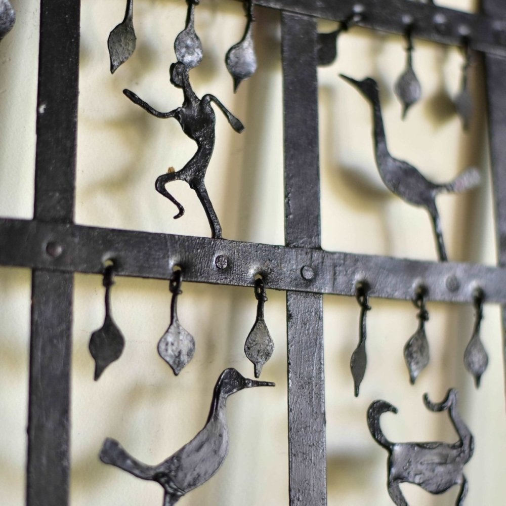 Handmade wrought iron candle stand with Bastar tribal forest motifs