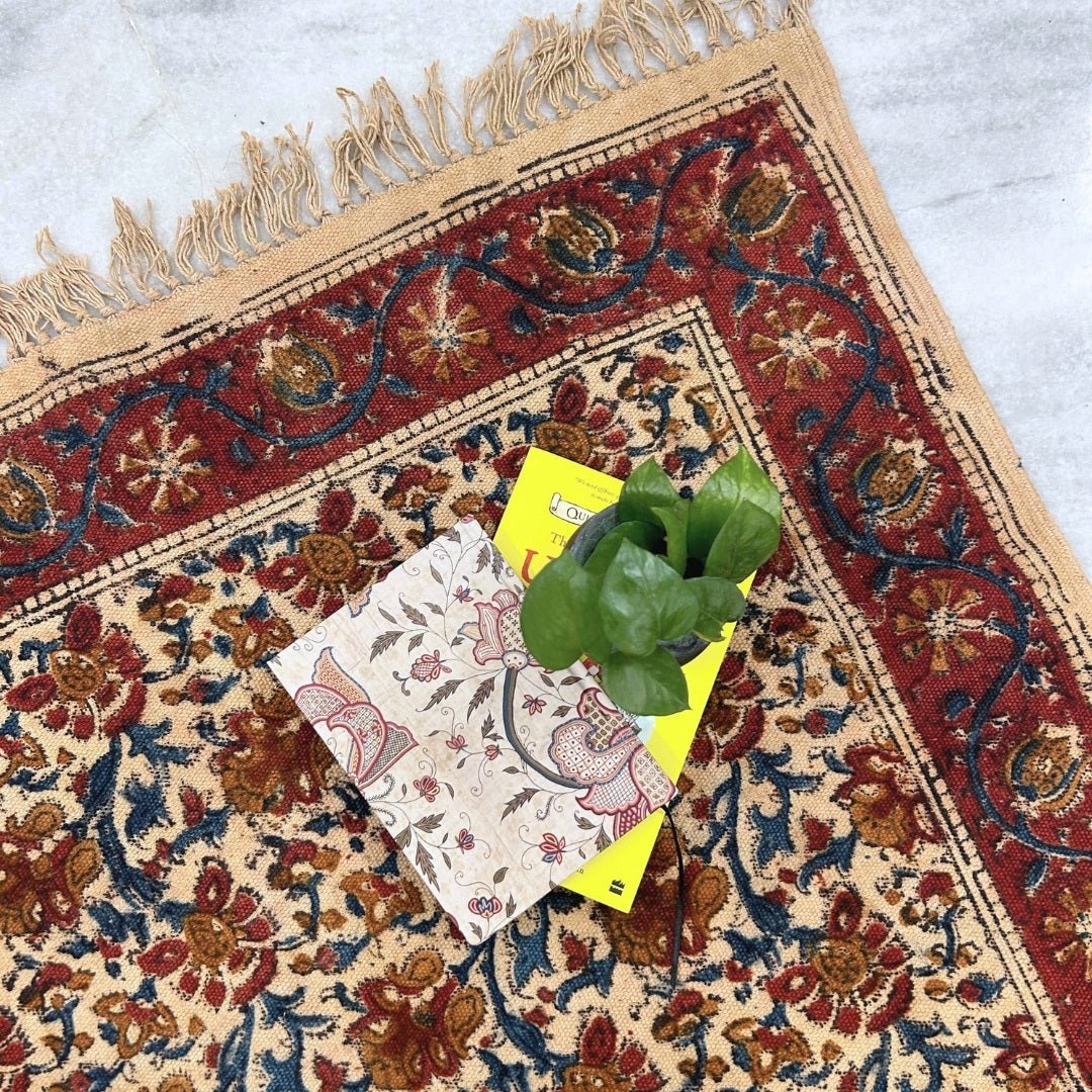 Handcrafted Kalamkari Print Cotton Rug with a Maroon, Beige, and Blue Floral Design