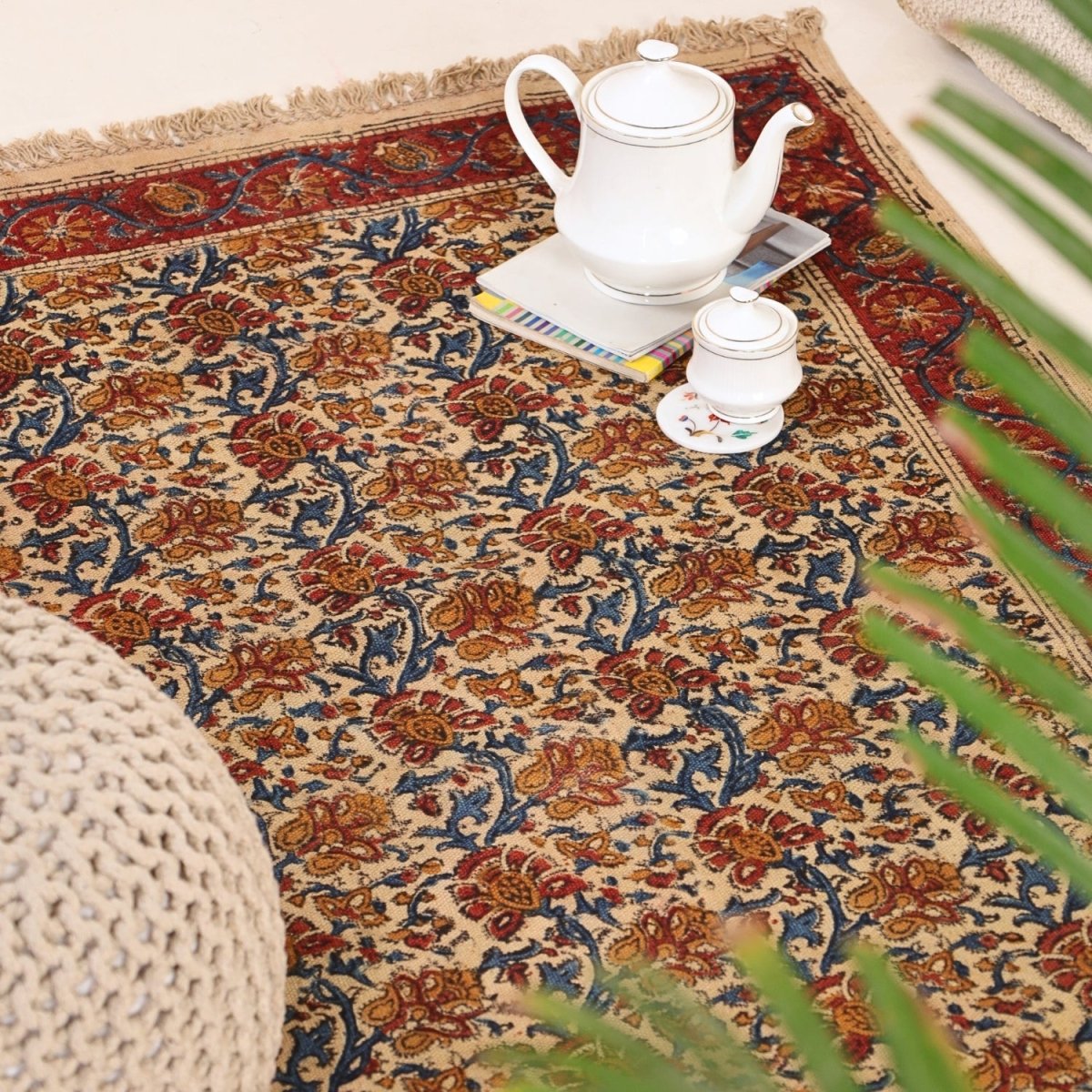 Handcrafted Kalamkari Print Cotton Rug with a Maroon, Beige, and Blue Floral Design