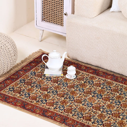 Handcrafted Kalamkari Print Cotton Rug with a Maroon, Beige, and Blue Floral Design