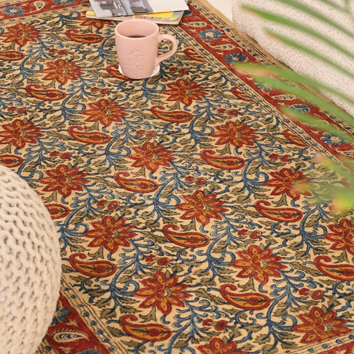 Handcrafted Kalamkari Print Cotton Rug with a Paisley Pattern in Red, Blue, and Beige