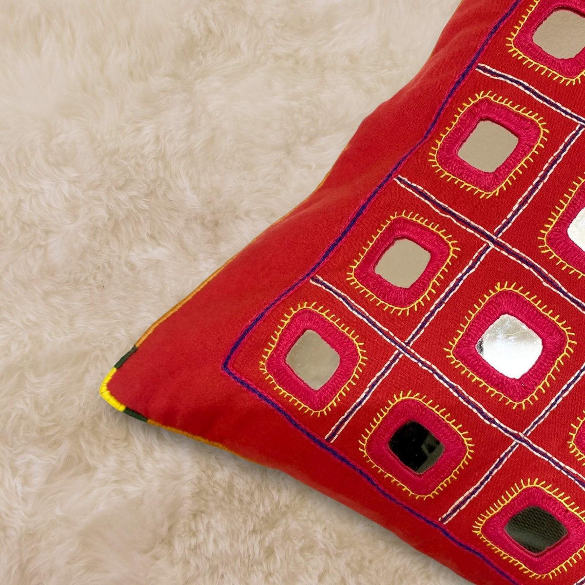 Artisanal red Lambani Starlight cushion cover, perfect for adding a cultural touch 