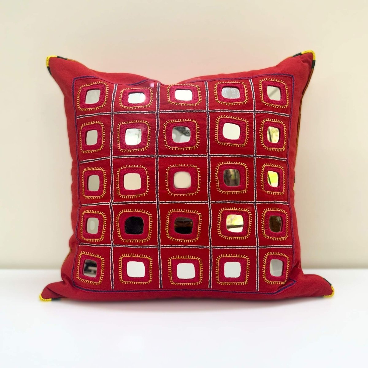Artisanal red Lambani Starlight cushion cover, perfect for adding a cultural touch 