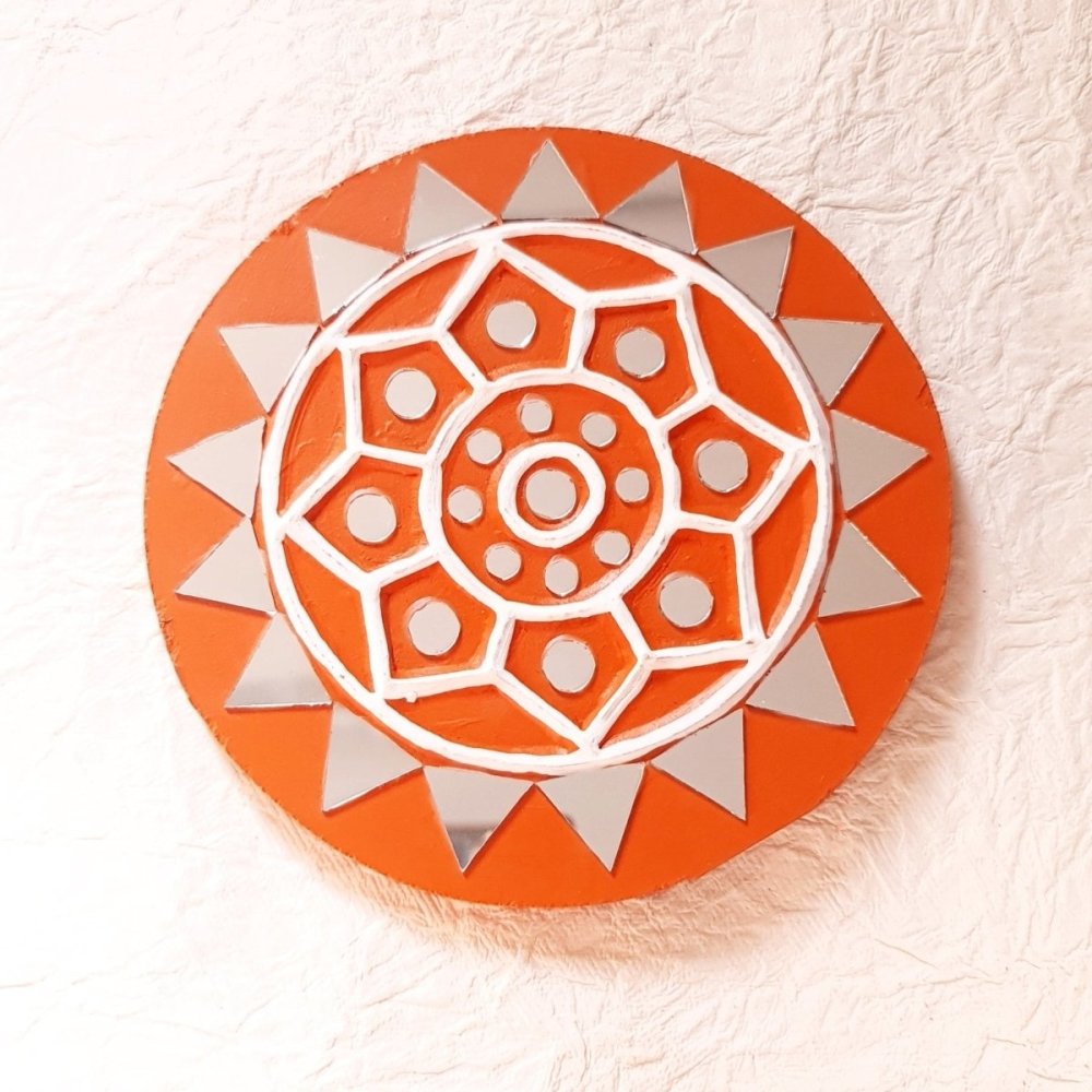 Set of 2 round bright brick-colored handcrafted mud and mirror work wall art pieces