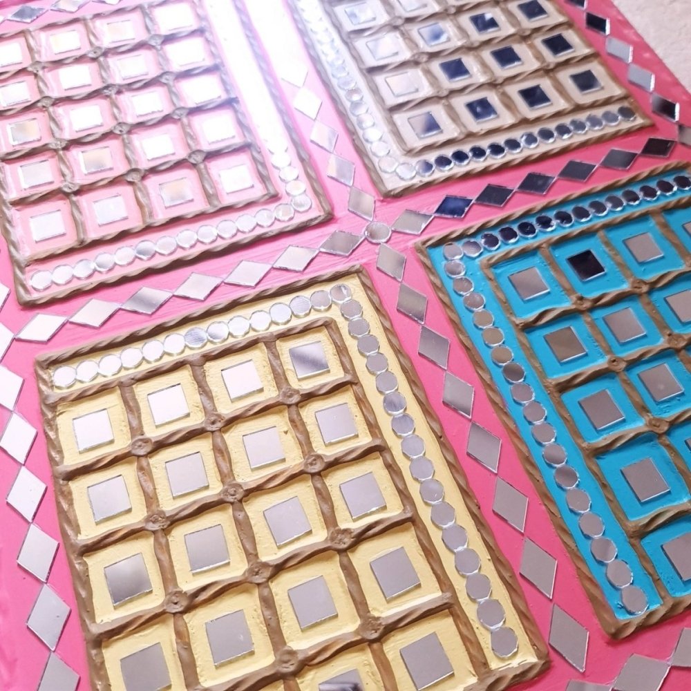 Decorative multicolored handcrafted dazzle mud wall art, perfect for adding a lively touch
