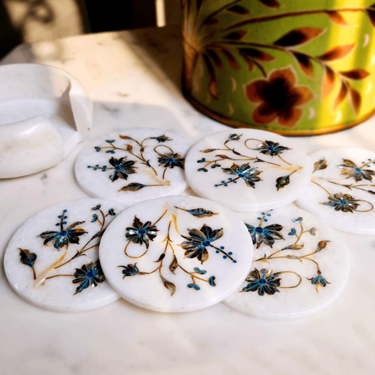 Mother of pearl on marble inlay coasters inspired by the Taj Mahal, adding opulence to your decor