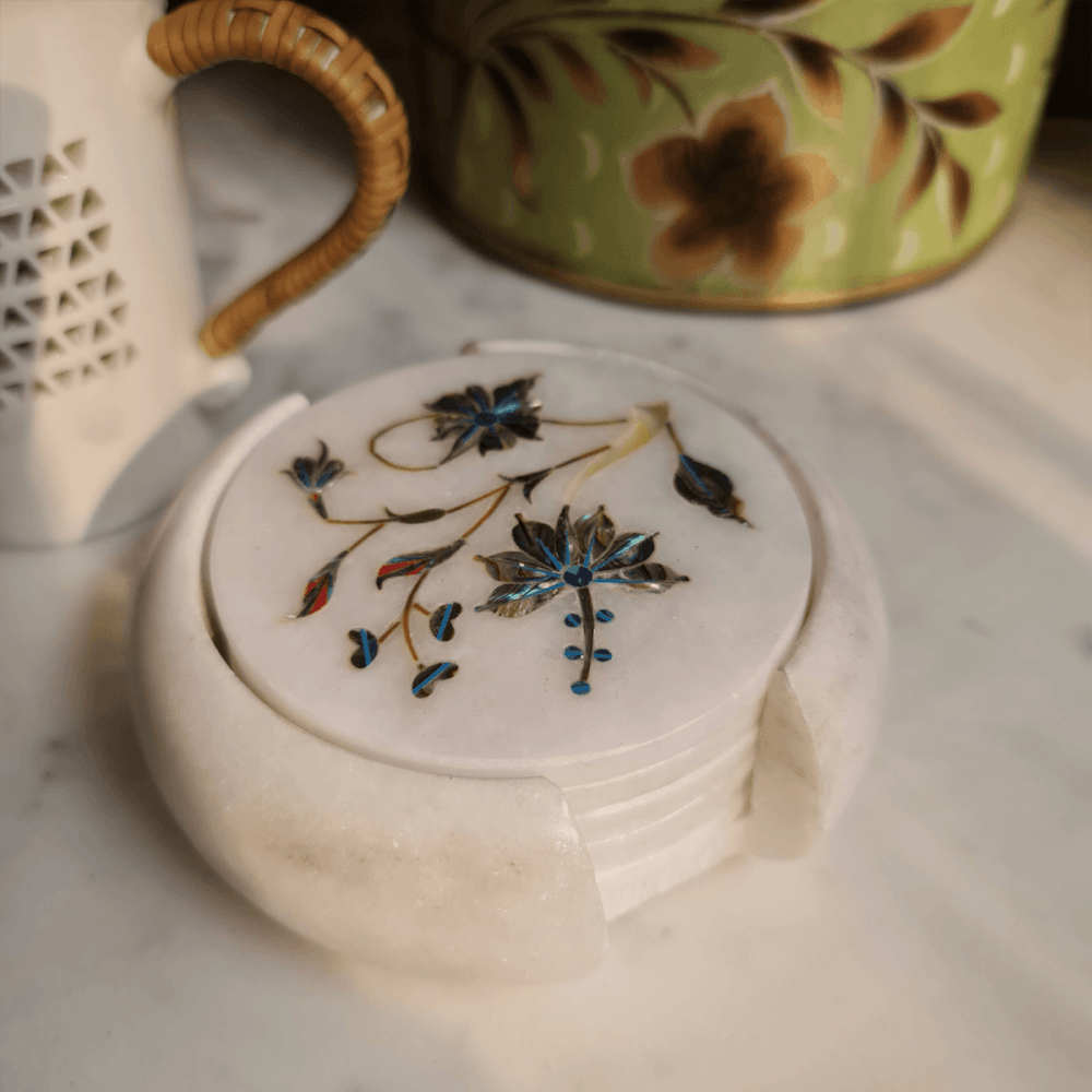 Taj Mahal-inspired mother of pearl on marble inlay coasters, featuring exquisite designs