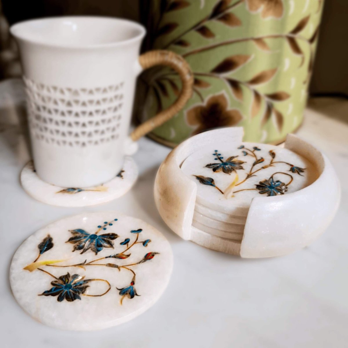 Decorative mother of pearl on marble inlay coasters inspired by the Taj Mahal, perfect for a touch of elegance
