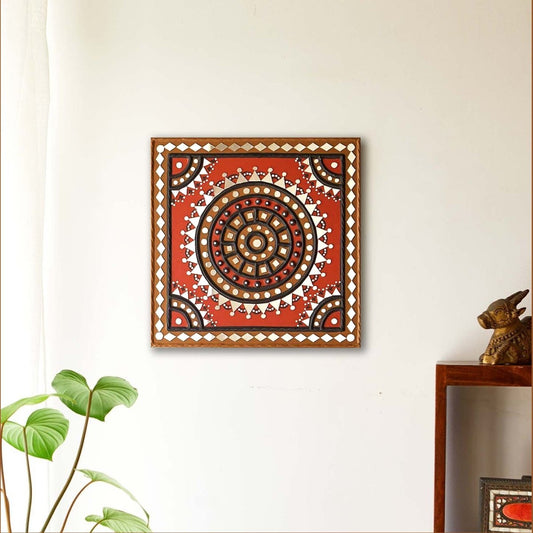 Handcrafted square mud wall art in red and black, adding a bold and artistic touch