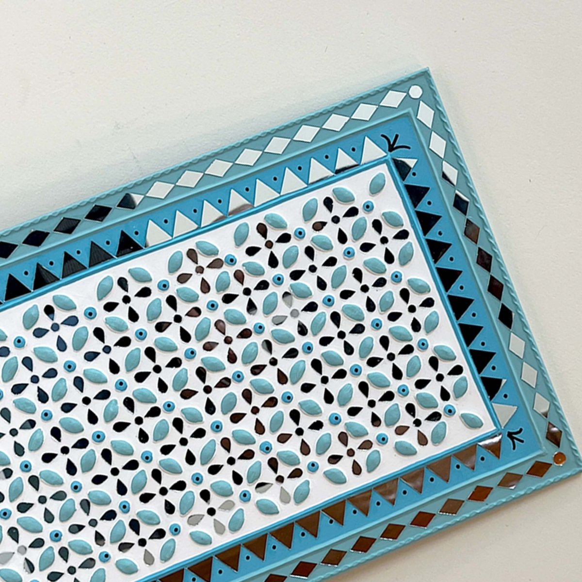 Ocean blue handmade mud art wall hanging, featuring a tranquil color and rustic charm