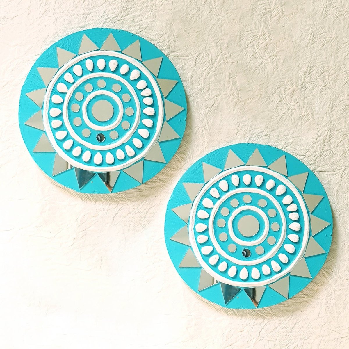 Set of 2 round turquoise handcrafted mud and mirror work wall decor pieces